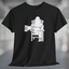 Black t-shirt with white graphic of Bigfoot relaxing in a chair and enjoying a mug of beer.