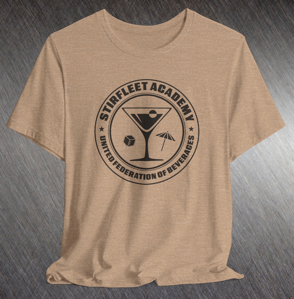 Heather tan t-shirt, with black United Federation of Beverages Stirfleet Academy logo, martini glass ice cube umbrella graphic on front of shirt.