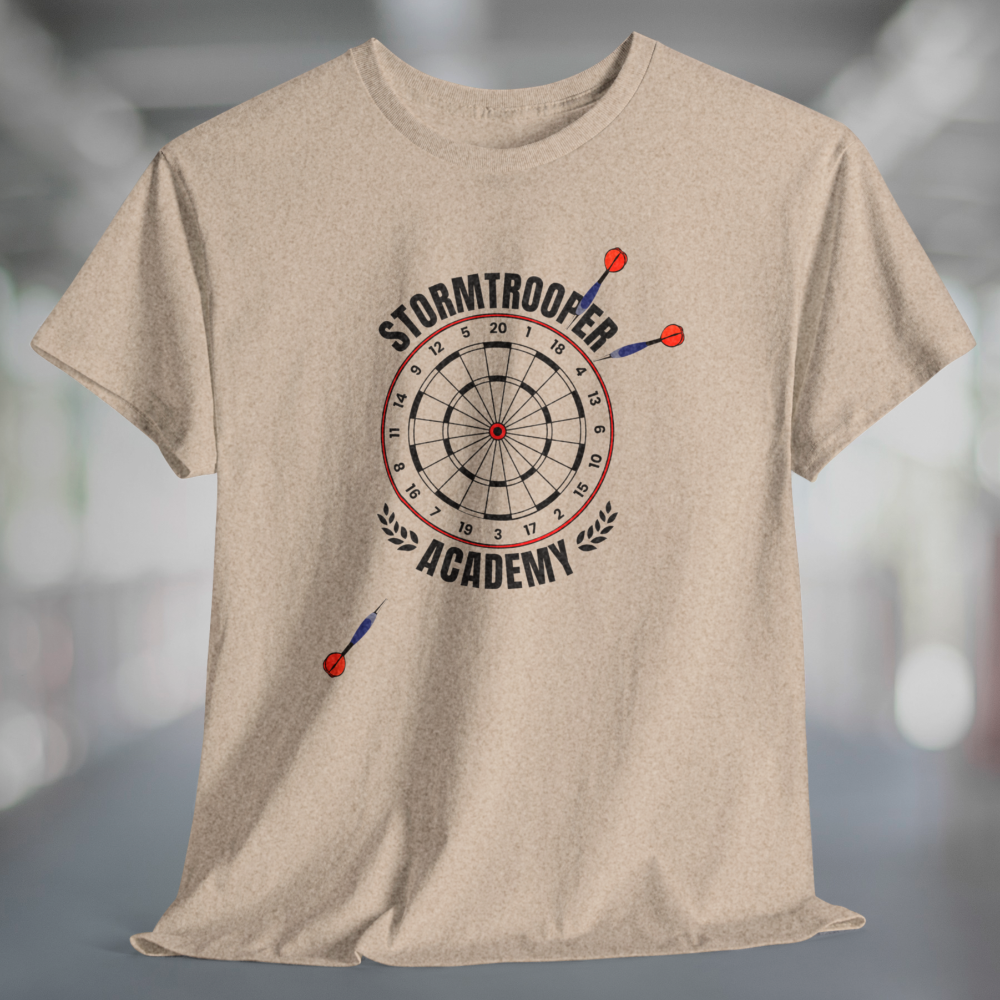 Heather tan t-shirt with printed graphic of a dartboard, 3 darts missing the board, and black text Stormtrooper Academy.
