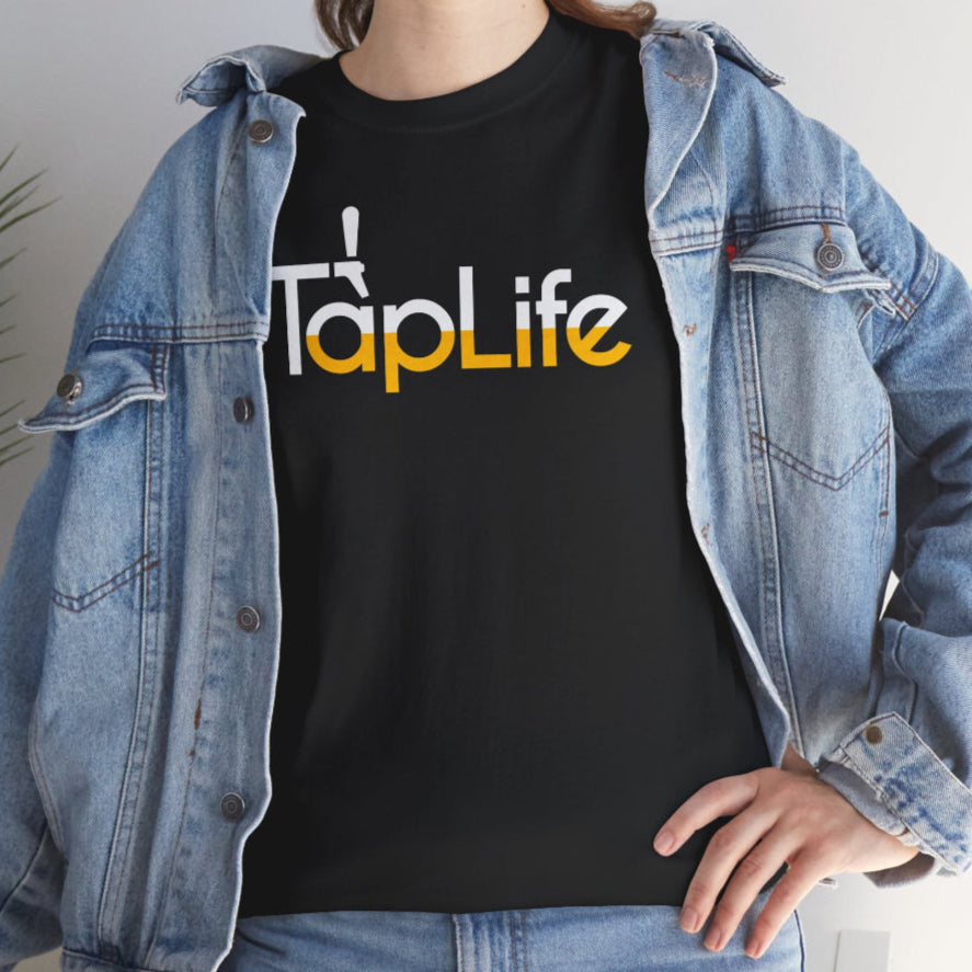 Woman wearing Black t-shirt with large beer Tap Life logo across the chest.