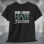 Wine Lovers Hate Fascism T-Shirt displayed on a black short sleeve unisex t-shirt