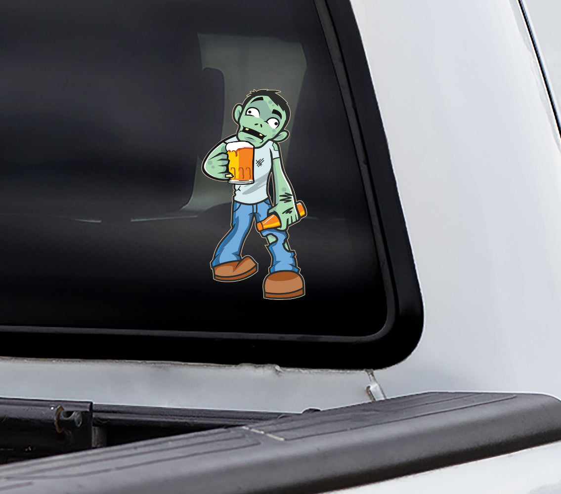 back window of truck with sticker of cartoon zombie holding beer mug and bottle of beer.