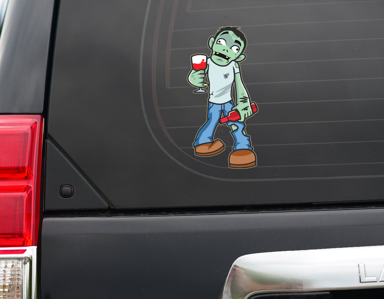 Rear window of car with sticker decal of wine life cartoon zombie holding wine glass and bottle of wine.