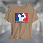 Heather tan t-shirt with white silhouette of man drinking beer with red and blue background, like professional sports logo, and words Big League underneath