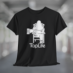 Black t-shirt with white graphic of Bigfoot holding a beer mug, sitting in a lawn chair with leg crossed in relaxed position, Tap Life logo below.