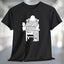Bigfoot Wine T-Shirt featuring Sasquatch relaxing with a glass of wine on a black short sleeve t-shirt.