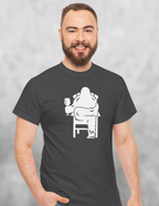 Man wearing Heather charcoal gray t-shirt with white print of Bigfoot relaxing in a chair and enjoying a glass of wine.