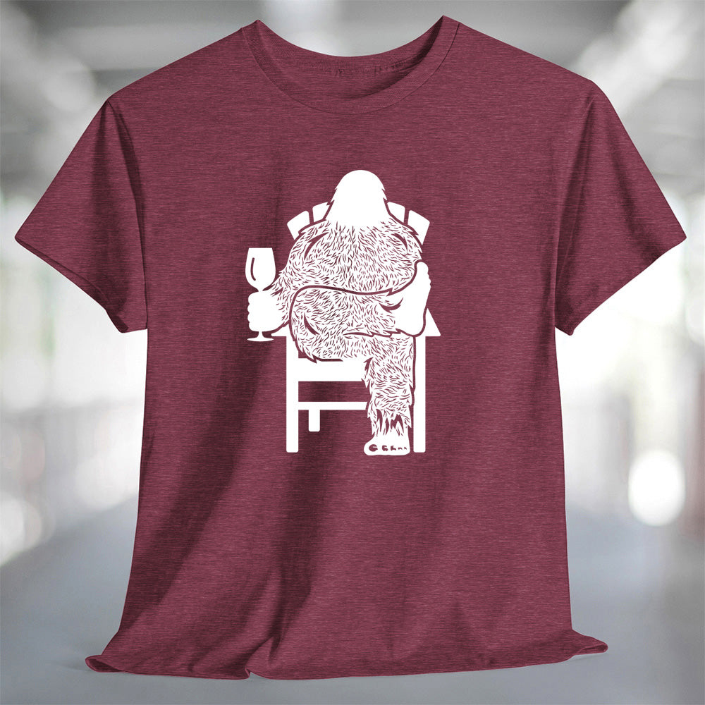 Bigfoot Wine T-Shirt featuring a Sasquatch relaxing in a chair holding a glass of wine.