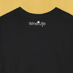 Back neckline of a black t-shirt with Wine Life logo featuring a white wine glass and corkscrew