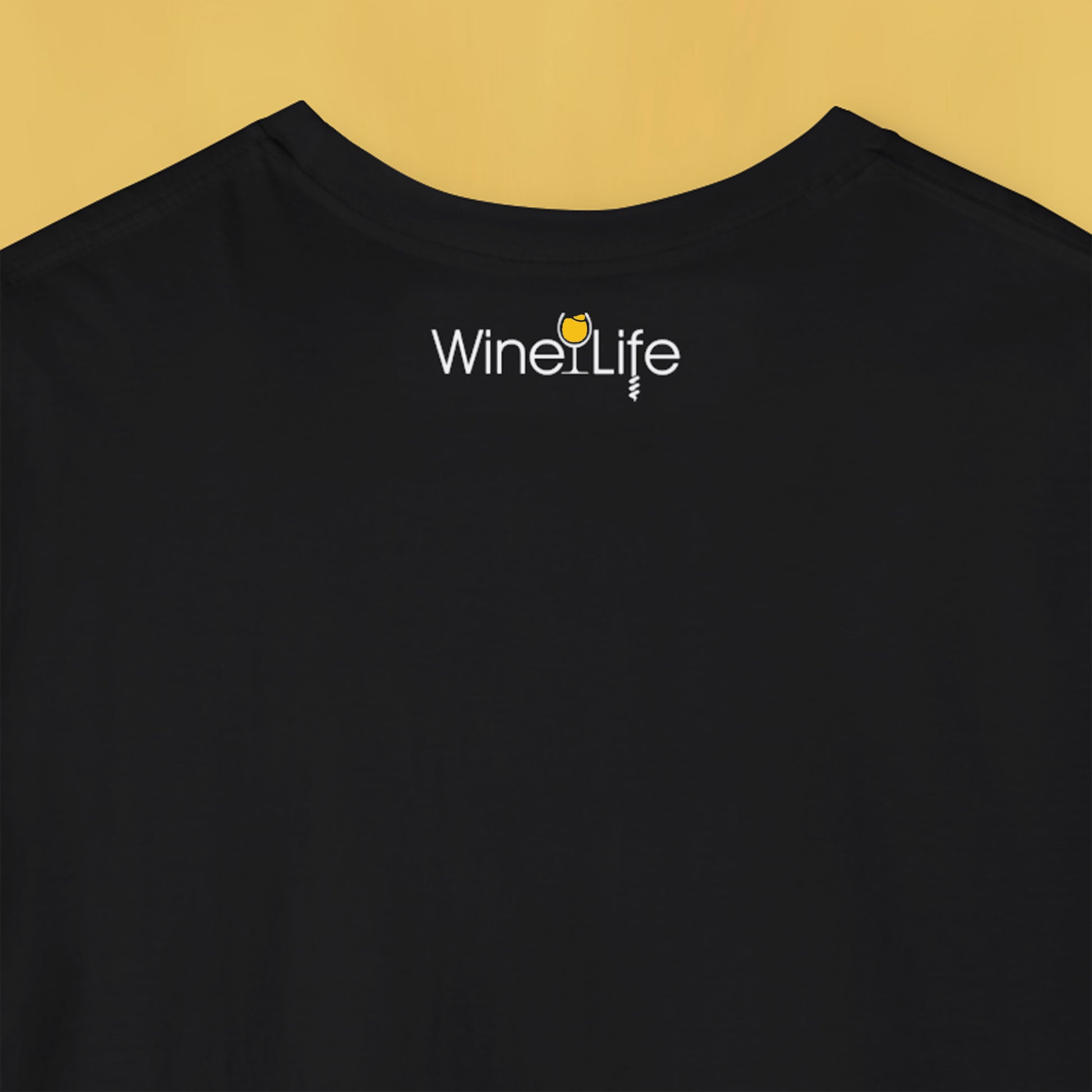 back neckline of black t-shirt with wine life logo of yellow wine glass and corkscrew