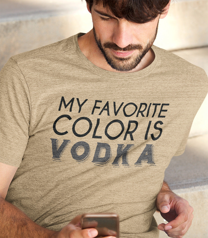 "My Favorite Color is Vodka" text on a tan t-shirt with a reclining man.