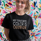 My Favorite Color is Champagne T-Shirt displayed on a model against a colorful floral background.