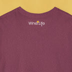Back neckline of Heather red maroon t-shirt with wine life written in swirly script letters, and a glass of golden yellow white wine