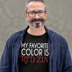 Man wearing My Favorite Color is Red Zin T-Shirt, showcasing love for big red wines in a stylish and soft tee.