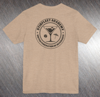 Heather tan t-shirt, with black United Federation of Beverages Stirfleet Academy logo, martini glass ice cube umbrella graphic on back of shirt.