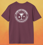 Heather red maroon t-shirt, with white United Federation of Beverages Stirfleet Academy logo, martini glass ice cube umbrella graphic on back of shirt.
