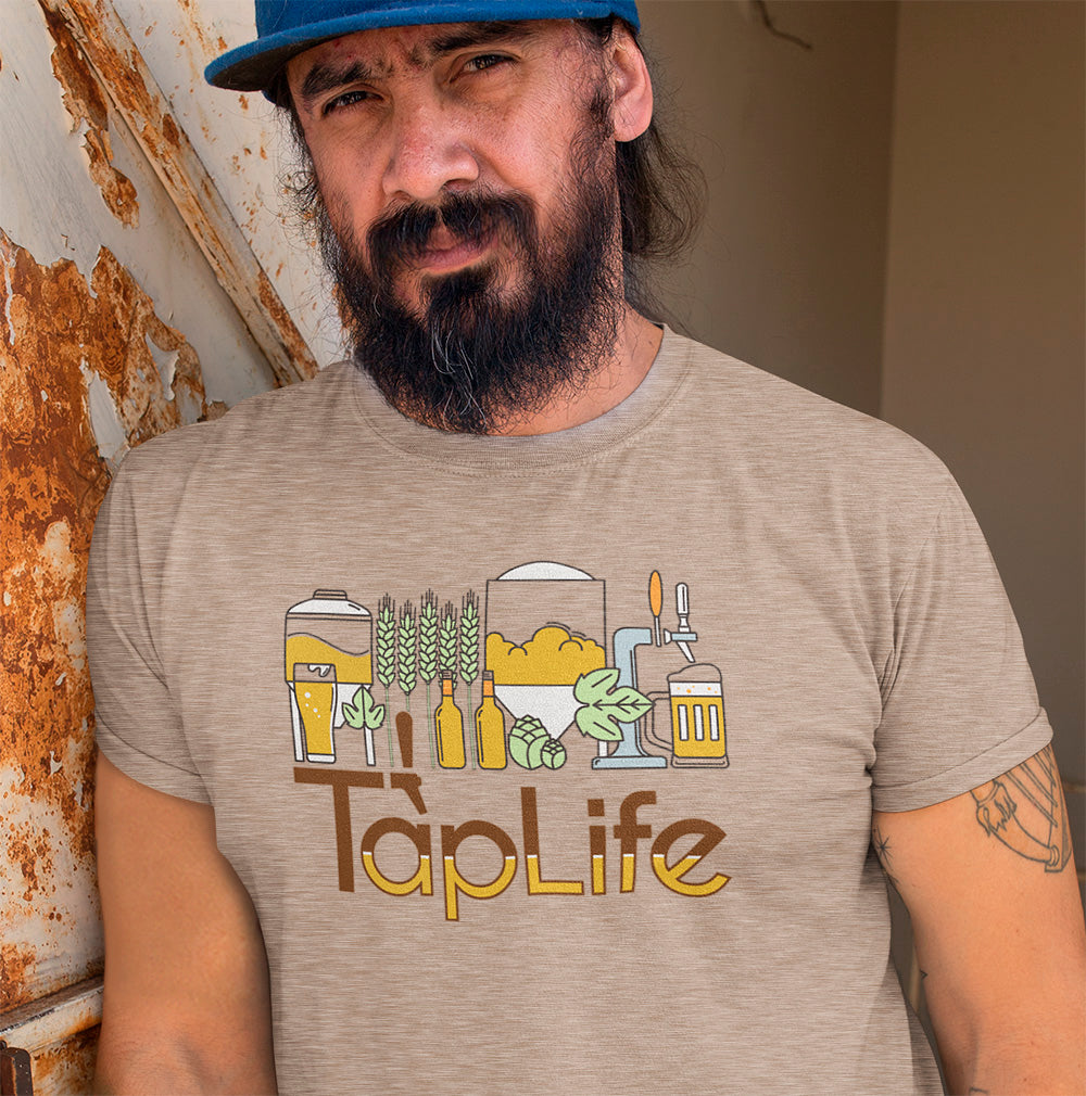 Man wearing a tan 'Tap Life' t-shirt with beer and brewery themed graphics 