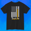 Back of black t-shirt with print of American flag, with one stripe yellow pouring from a beer tap, Tap Life logo below