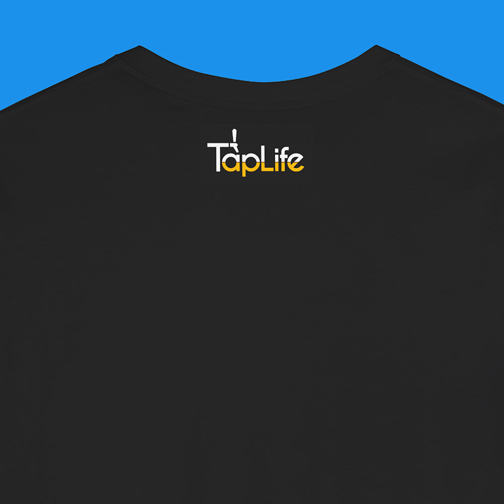 Back neckline of a black t-shirt with 'Tap Life' logo on a blue background