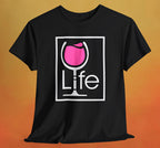 A black t-shirt with a Wine Life logo and a pink wine glass inside a rectangle.