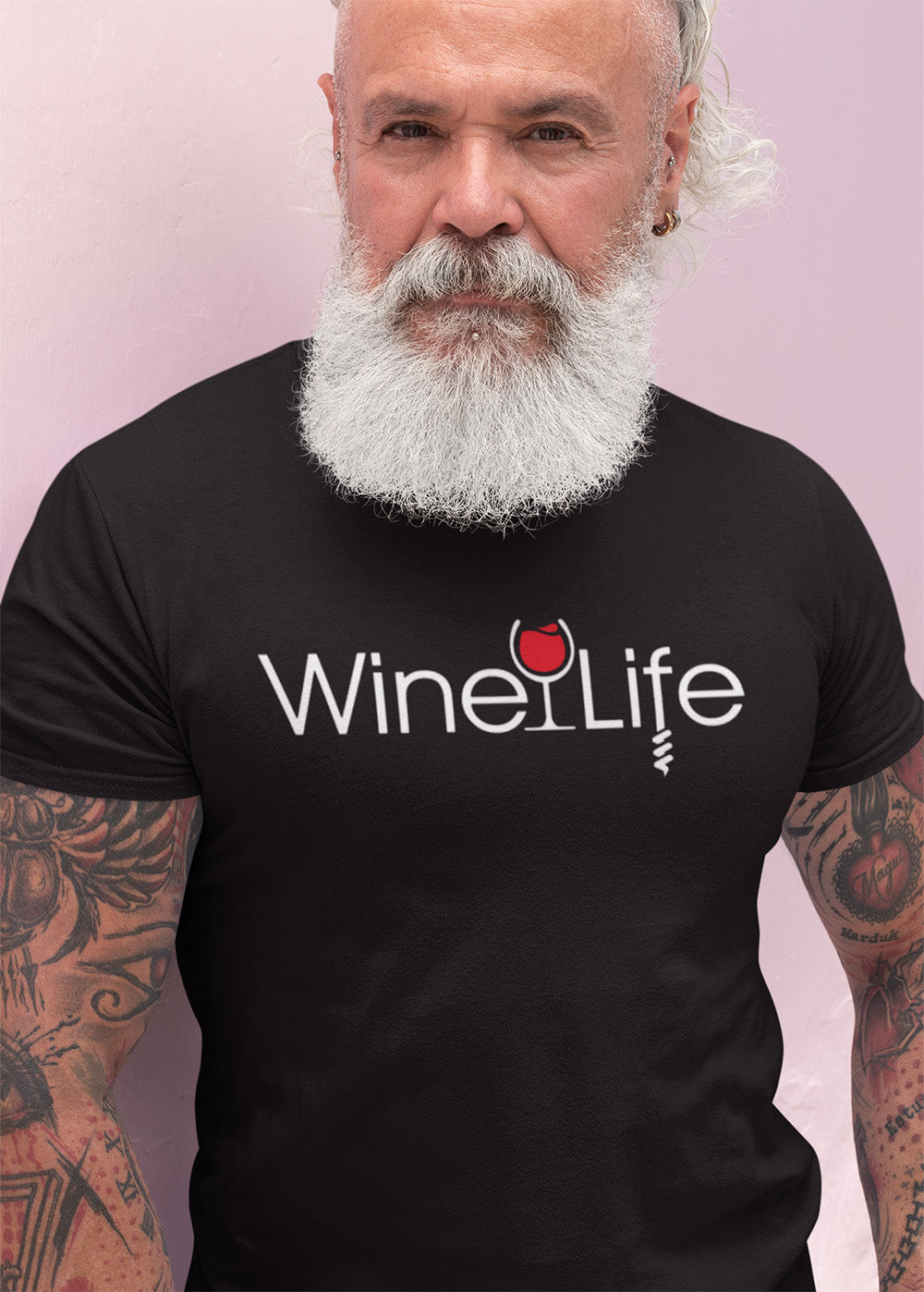 Man wearing a black t-shirt with Wine Life logo on front, with red wine glass and corkscrew