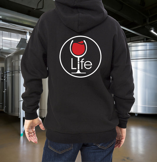 Man wearing a black hoodie, with the Wine Life round logo, the i is the stem of wine glass with red wine