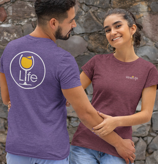 Happy couple wearing wine life t-shirts, with round life logo with yellow wine glass on back, small logo on front
