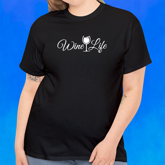 Woman wearing black t-shirt with wine life written in swirly script letters, and a glass of white wine