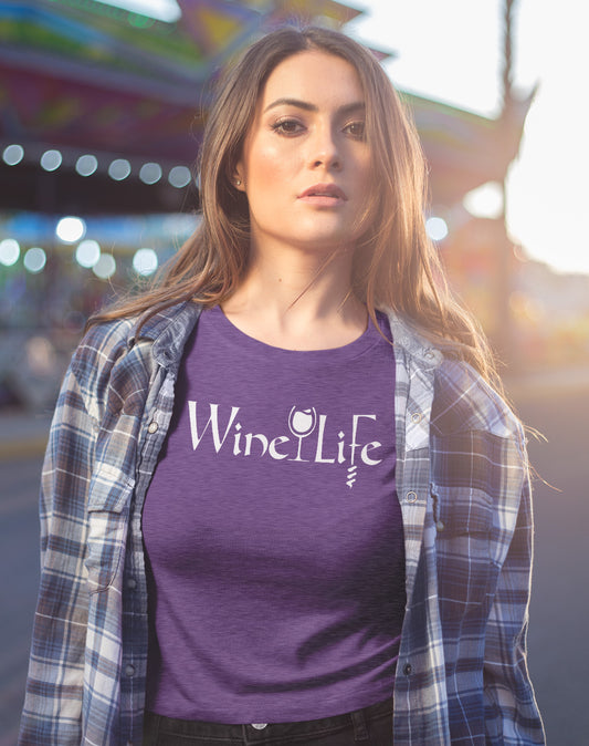 Woman wearing heather purple t-shirts, with calligraphy like white jagged letters that say Wine Life, with a white wine glass and corkscrew