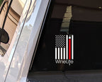 White decal of American flag with one red stripe pouring from a wine glass, Wine Life logo below
