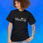Woman wearing black t-shirt, white Wine Life logo with calligraphy styled letters, and wine glass full of golden white wine and corkscrew