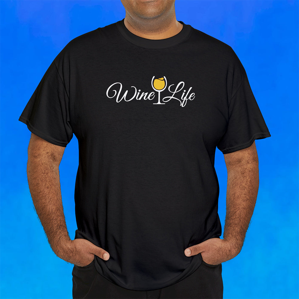 Man wearing Heather charcoal gray t-shirt with wine life written in swirly script letters, and a glass of golden yellow white wine