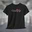 Black t-shirt, white Wine Life logo with script styled letters, and wine glass full of red wine.