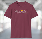 Heather red maroon t-shirt with wine life written in swirly script letters, and a glass of golden yellow white wine