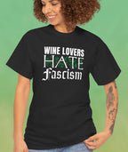 Woman wearing black shirt that says wine lovers hate fascism