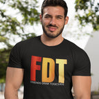 Man wearing a FDT Friends Drink Together T-Shirt in black with colorful letters, perfect for celebrating friendship.